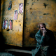 A coal miner smokes a cigarette after his shift in Enakievo.